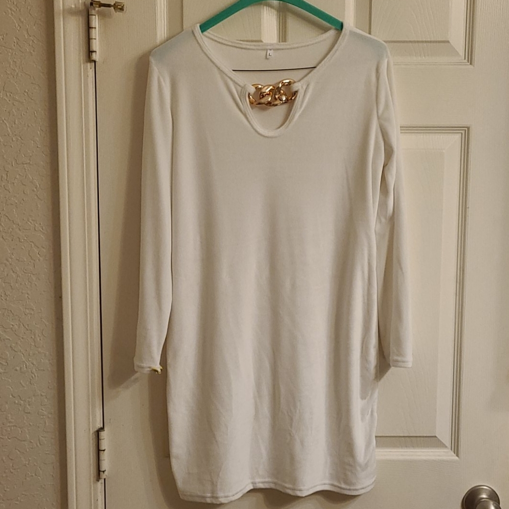 White dress with chain decoration